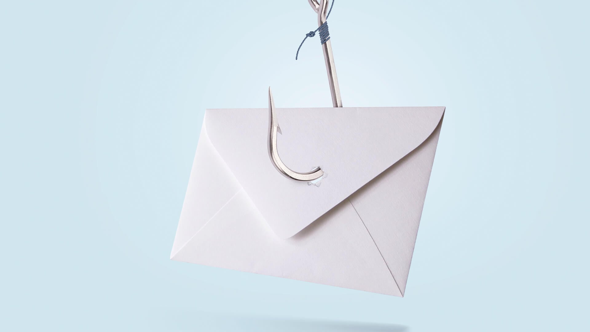 A fishing hook piercing an envelope, symbolizing email phishing attacks